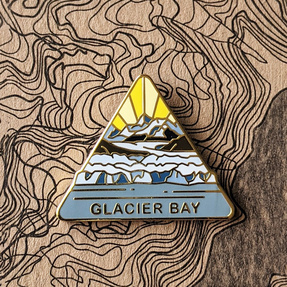 Triangle Glacier Bay national park enamel pin featuring a view of Margerie Glacier.