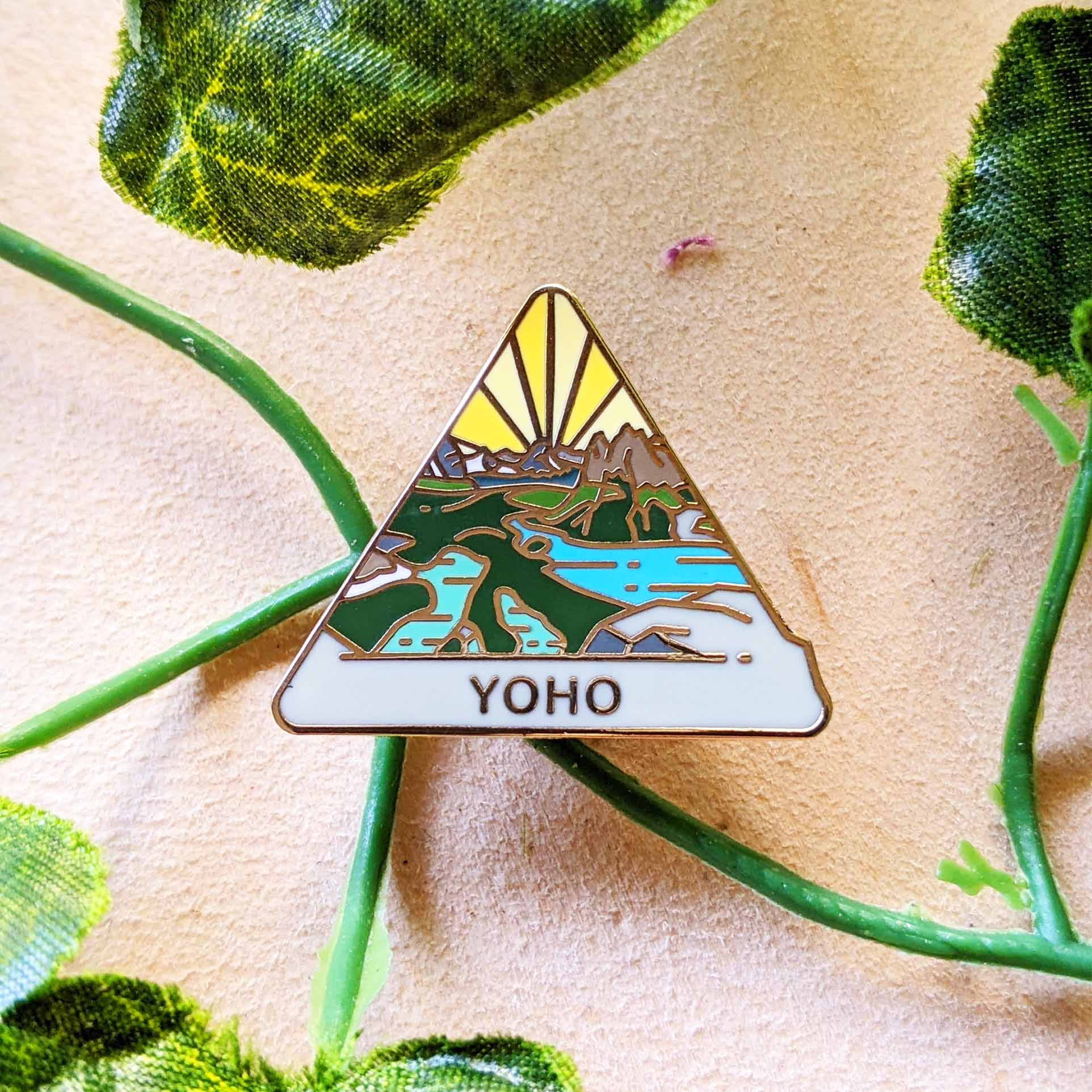  Triangle Yoho national park enamel pin featuring a view of Lake O'Hara.